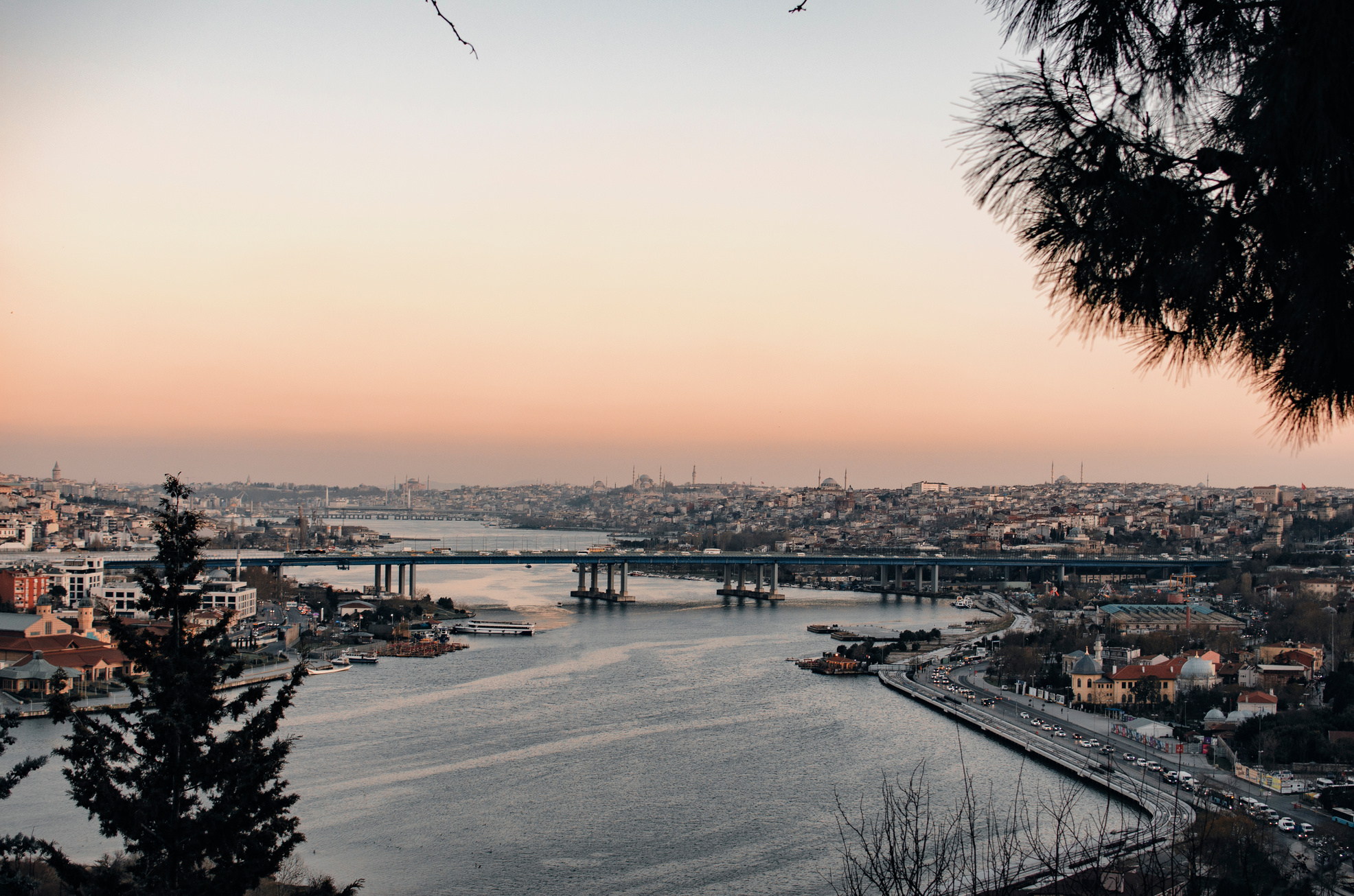 Picturesque cityscape with river during sundown